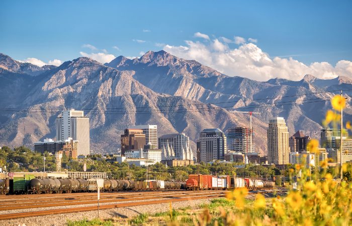 a photo of Salt Lake City with the surrounding mountains in the background